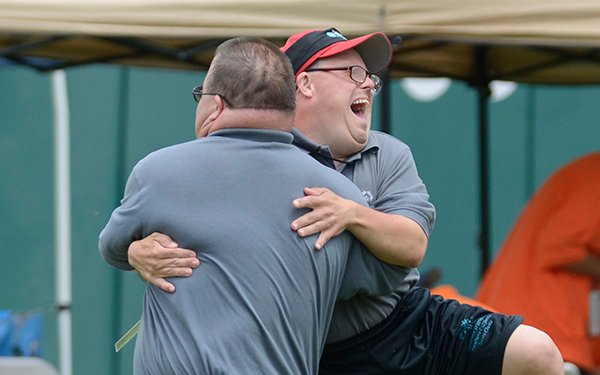Athletes Hug